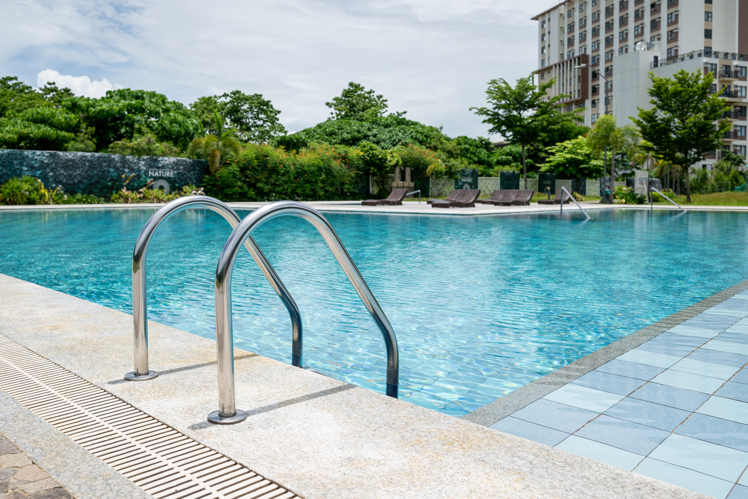 Lush, tree-lined grounds of a Taft Properties development in Mactan, Cebu
